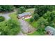 Bird's-eye view of a brick home with a long driveway and spacious backyard in a residential neighborhood at 1753 28Th Ne St, Hickory, NC 28601