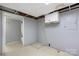 Finished basement room with tile floors and painted walls at 1753 28Th Ne St, Hickory, NC 28601