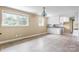 An open concept living room with a tiled floor and an eat-in kitchen area at 1753 28Th Ne St, Hickory, NC 28601