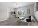 Relaxing bedroom provides a calming atmosphere with modern comforts and a pleasant view at 2042 Newport Dr, Fort Mill, SC 29707