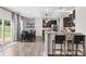 Stylish eat-in kitchen with breakfast bar, stainless appliances, granite counters, and seamless access to outdoor living at 2042 Newport Dr, Fort Mill, SC 29707