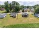 Aerial view captures several homes on a tree-lined neighborhood street at 206 13Th St, Belmont, NC 28012