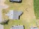 A bird's-eye view showing the house's roof and surrounding green lawn, providing a sense of property size at 206 13Th St, Belmont, NC 28012
