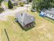 A top-down shot displaying a quaint home with a lush green yard, offering a sense of space and landscaping at 206 13Th St, Belmont, NC 28012