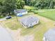 Aerial view captures several homes on a tree-lined neighborhood street at 206 13Th St, Belmont, NC 28012