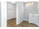 Bathroom features a storage vanity, a sink, and walk-in closet with wire shelving at 2112 Flint Glenn Ln, Charlotte, NC 28262