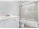 Bathroom features a storage vanity, toilet, and a glass door shower/tub combination at 2112 Flint Glenn Ln, Charlotte, NC 28262