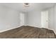 Bedroom showing neutral walls and flooring with doors on the side walls at 2112 Flint Glenn Ln, Charlotte, NC 28262