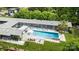 Aerial view of a modern home with a large pool and backyard at 2121 Valencia Ter, Charlotte, NC 28226
