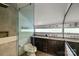Modern bathroom featuring a glass shower and vessel sinks at 2121 Valencia Ter, Charlotte, NC 28226