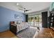 Bedroom with a large sliding glass door to the pool area at 2121 Valencia Ter, Charlotte, NC 28226