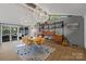Elegant dining area featuring modern lighting, sleek table setting, and an artistic display shelf at 2121 Valencia Ter, Charlotte, NC 28226