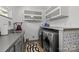 Efficient laundry room equipped with modern appliances and ample storage space at 2121 Valencia Ter, Charlotte, NC 28226