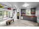 Bright living room featuring concrete floors, a kitchenette, and modern design at 2121 Valencia Ter, Charlotte, NC 28226