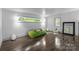Clean and modern upstairs loft space with hardwood floors at 2121 Valencia Ter, Charlotte, NC 28226