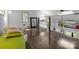 Upstairs loft featuring hardwood floors and a modern railing at 2121 Valencia Ter, Charlotte, NC 28226