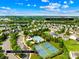 Aerial view showcases neighborhood amenities including pool and tennis courts close to the home at 2802 Azalea Hills Dr, Charlotte, NC 28262