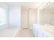 Bright bathroom featuring double sinks, a large tub, and a separate shower for a spa-like experience at 2802 Azalea Hills Dr, Charlotte, NC 28262