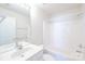 Bright bathroom showcasing a single sink vanity and a tub-shower combo with a shower curtain at 2802 Azalea Hills Dr, Charlotte, NC 28262