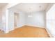 Inviting dining area featuring wood floors, a window, and neutral walls at 2802 Azalea Hills Dr, Charlotte, NC 28262