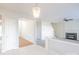 Open concept living space featuring a fireplace and staircase at 2802 Azalea Hills Dr, Charlotte, NC 28262