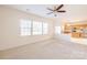Inviting living room showcasing an open layout connecting to the kitchen area with stainless appliances at 2802 Azalea Hills Dr, Charlotte, NC 28262