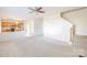 Open-concept living room with kitchen access featuring wood cabinetry, and stainless steel appliances at 2802 Azalea Hills Dr, Charlotte, NC 28262