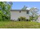 Two story home featuring a lush, green backyard at 2908 Burgess Dr, Charlotte, NC 28208