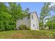 Two story home featuring a lush, green backyard at 2908 Burgess Dr, Charlotte, NC 28208