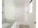 A clean bathroom featuring a shower, white vanity, and granite countertop at 2908 Burgess Dr, Charlotte, NC 28208