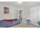Bright bedroom with neutral walls, carpet flooring, and a twin bed with fun linens at 2908 Burgess Dr, Charlotte, NC 28208