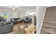 Spacious living room flows into the kitchen creating an open concept living space at 2908 Burgess Dr, Charlotte, NC 28208