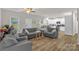 Inviting living room blending into a modern kitchen, perfect for Gathering gatherings at 2908 Burgess Dr, Charlotte, NC 28208