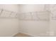 Spacious walk-in closet with ample shelving for optimal storage in a well-lit space at 3019 Sassafras Trl, Gastonia, NC 28056