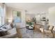 Open-concept living room with an adjacent kitchen and dining area, perfect for modern living and entertaining at 3019 Sassafras Trl, Gastonia, NC 28056
