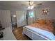 Bright bedroom with hardwood floors, a comfortable bed, and ample closet space creates a relaxing retreat at 3116 Pilgrim Rd, Chester, SC 29706
