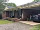 Brick home with covered porch and convenient carport provides ample parking and outdoor space at 3116 Pilgrim Rd, Chester, SC 29706