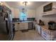 Bright kitchen features white cabinetry, stainless steel appliances, and a functional layout for cooking and entertaining at 3116 Pilgrim Rd, Chester, SC 29706