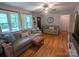 Comfortable living room with gleaming hardwood floors and lots of natural light provides a relaxing atmosphere at 3116 Pilgrim Rd, Chester, SC 29706