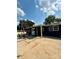 Charming blue home featuring a concrete patio with outdoor furniture, perfect for entertaining or relaxing at 314 Euclid Ave, Statesville, NC 28677