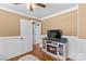 Bedroom featuring a media center with a fireplace, neutral walls, and hardwood flooring at 314 Euclid Ave, Statesville, NC 28677