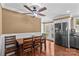 Cozy dining area featuring a wooden table set, a ceiling fan, and lots of natural light at 314 Euclid Ave, Statesville, NC 28677