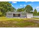 Charming single-story home with a well-maintained front yard and attached garage at 314 Euclid Ave, Statesville, NC 28677