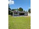 This charming single-story home features a well-manicured lawn and a cozy front porch, all set against a clear blue sky at 314 Euclid Ave, Statesville, NC 28677