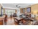 Comfortable living room featuring hardwood floors, ample seating, and natural light at 314 Euclid Ave, Statesville, NC 28677