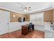 Office features a dark wood desk and chair, neutral walls, hardwood flooring, and a modern window at 314 Euclid Ave, Statesville, NC 28677