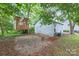 Backyard with a playhouse, and a detached garage at 319 S Oakland St, Gastonia, NC 28052