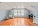 Spacious bedroom with hardwood floors, ample windows, and versatile layout at 319 S Oakland St, Gastonia, NC 28052