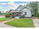 Charming craftsman home with a brick pathway, inviting porch, and meticulously kept lawn at 319 S Oakland St, Gastonia, NC 28052
