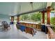 Charming front porch with a swing, rocking chair, and views of the neighborhood at 319 S Oakland St, Gastonia, NC 28052